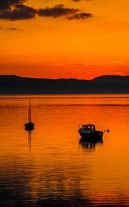 Preview wallpaper boats, lake, hills, sunset