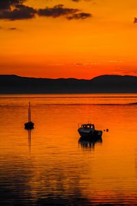 Preview wallpaper boats, lake, hills, sunset