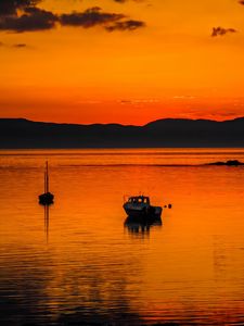 Preview wallpaper boats, lake, hills, sunset