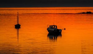 Preview wallpaper boats, lake, hills, sunset