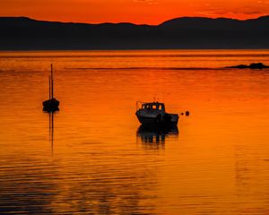 Preview wallpaper boats, lake, hills, sunset