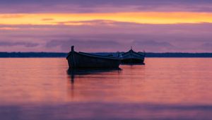 Preview wallpaper boats, lake, horizon, sunset, dark