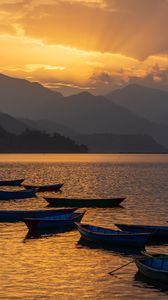Preview wallpaper boats, lake, mountains, bay, sunset