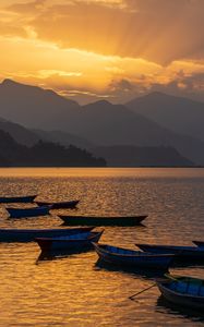 Preview wallpaper boats, lake, mountains, bay, sunset