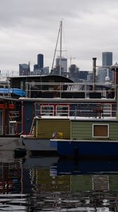 Preview wallpaper boats, mast, buildings, pier