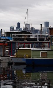 Preview wallpaper boats, mast, buildings, pier