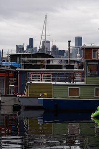 Preview wallpaper boats, mast, buildings, pier