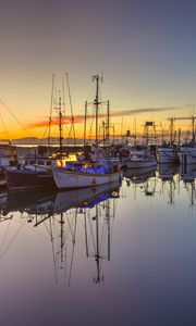 Preview wallpaper boats, masts, lake, reflection, sunrise