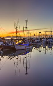 Preview wallpaper boats, masts, lake, reflection, sunrise