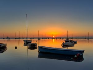 Preview wallpaper boats, masts, lake, sunset, horizon