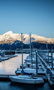 Preview wallpaper boats, masts, mountains, snow, bay