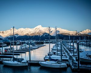 Preview wallpaper boats, masts, mountains, snow, bay