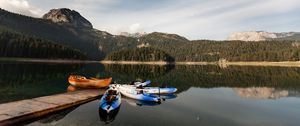 Preview wallpaper boats, mountains, lake, pier, starry sky, stars