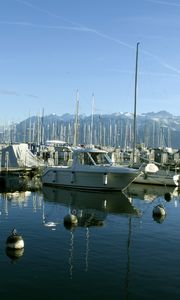 Preview wallpaper boats, pier, bay, masts, sea, mountains