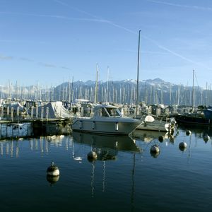 Preview wallpaper boats, pier, bay, masts, sea, mountains