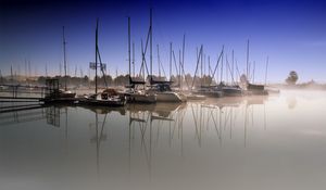 Preview wallpaper boats, pier, fog, water smooth surface, sailing vessels, morning