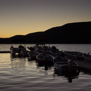 Preview wallpaper boats, pier, lake, dusk