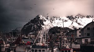 Preview wallpaper boats, pier, mountains, birds, snow covered