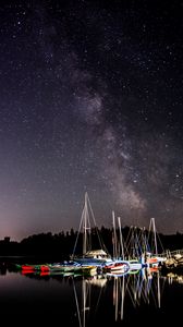 Preview wallpaper boats, pier, river, night, milky way