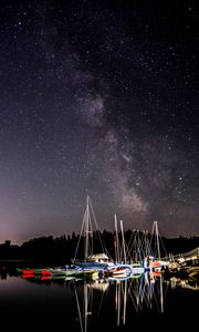 Preview wallpaper boats, pier, river, night, milky way