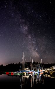 Preview wallpaper boats, pier, river, night, milky way