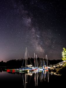 Preview wallpaper boats, pier, river, night, milky way