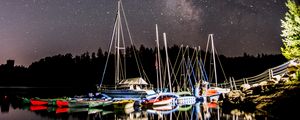 Preview wallpaper boats, pier, river, night, milky way