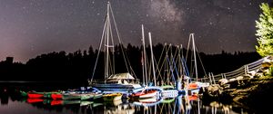 Preview wallpaper boats, pier, river, night, milky way