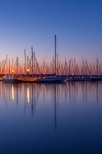 Preview wallpaper boats, pier, sea, water, twilight