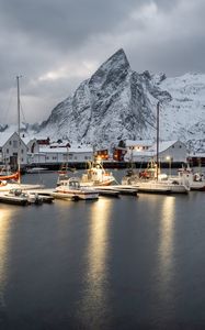 Preview wallpaper boats, pier, sea, mountains, snow