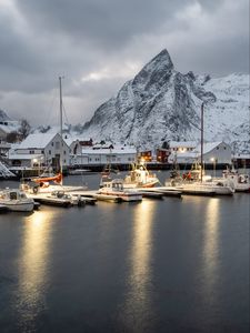 Preview wallpaper boats, pier, sea, mountains, snow