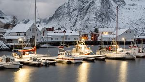 Preview wallpaper boats, pier, sea, mountains, snow