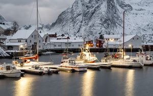 Preview wallpaper boats, pier, sea, mountains, snow