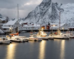 Preview wallpaper boats, pier, sea, mountains, snow