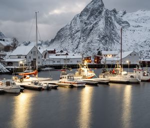 Preview wallpaper boats, pier, sea, mountains, snow