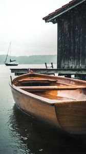 Preview wallpaper boats, pier, water, rain