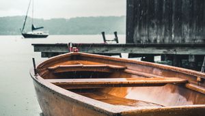 Preview wallpaper boats, pier, water, rain