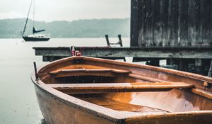 Preview wallpaper boats, pier, water, rain