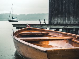 Preview wallpaper boats, pier, water, rain