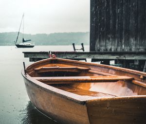 Preview wallpaper boats, pier, water, rain
