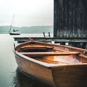 Preview wallpaper boats, pier, water, rain