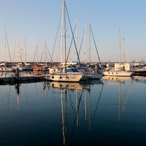 Preview wallpaper boats, pier, water, reflection