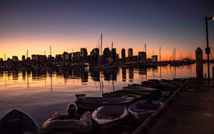 Preview wallpaper boats, river, buildings, dawn, city