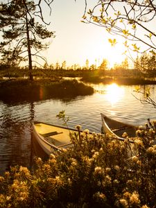 Preview wallpaper boats, river, rays, bushes