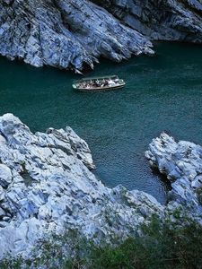 Preview wallpaper boats, rocks, river