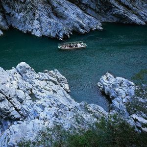 Preview wallpaper boats, rocks, river