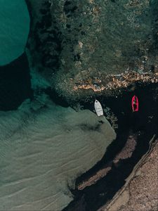 Preview wallpaper boats, rocks, water, shore, aerial view