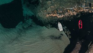 Preview wallpaper boats, rocks, water, shore, aerial view