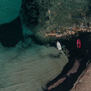 Preview wallpaper boats, rocks, water, shore, aerial view