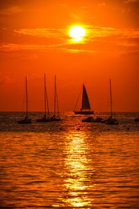 Preview wallpaper boats, sails, sea, horizon, sunset